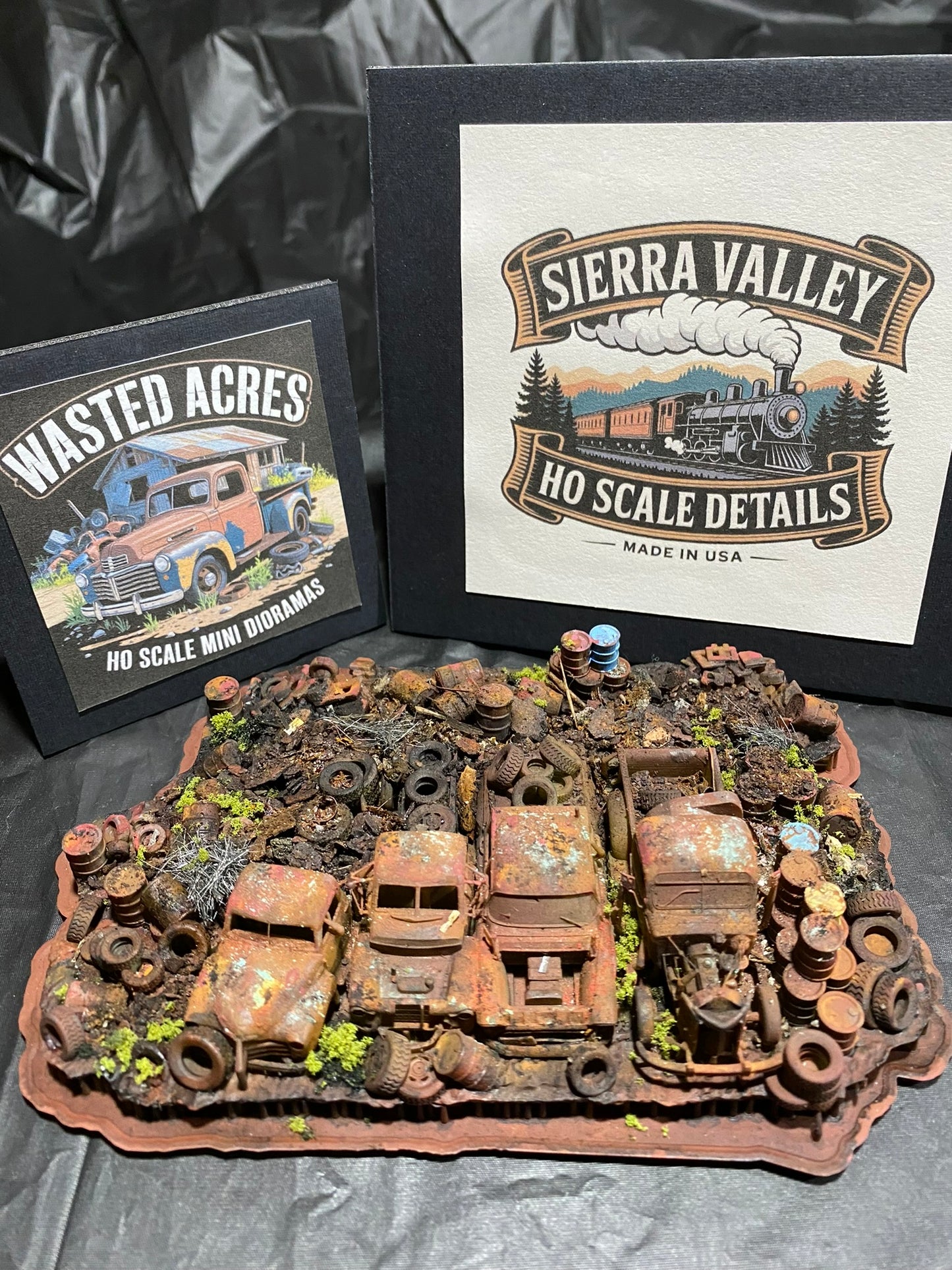 Sierra Valley Wasted Acres Mini Diorama with 4 Trucks, Tires, Barrels & Scrap HO Scale